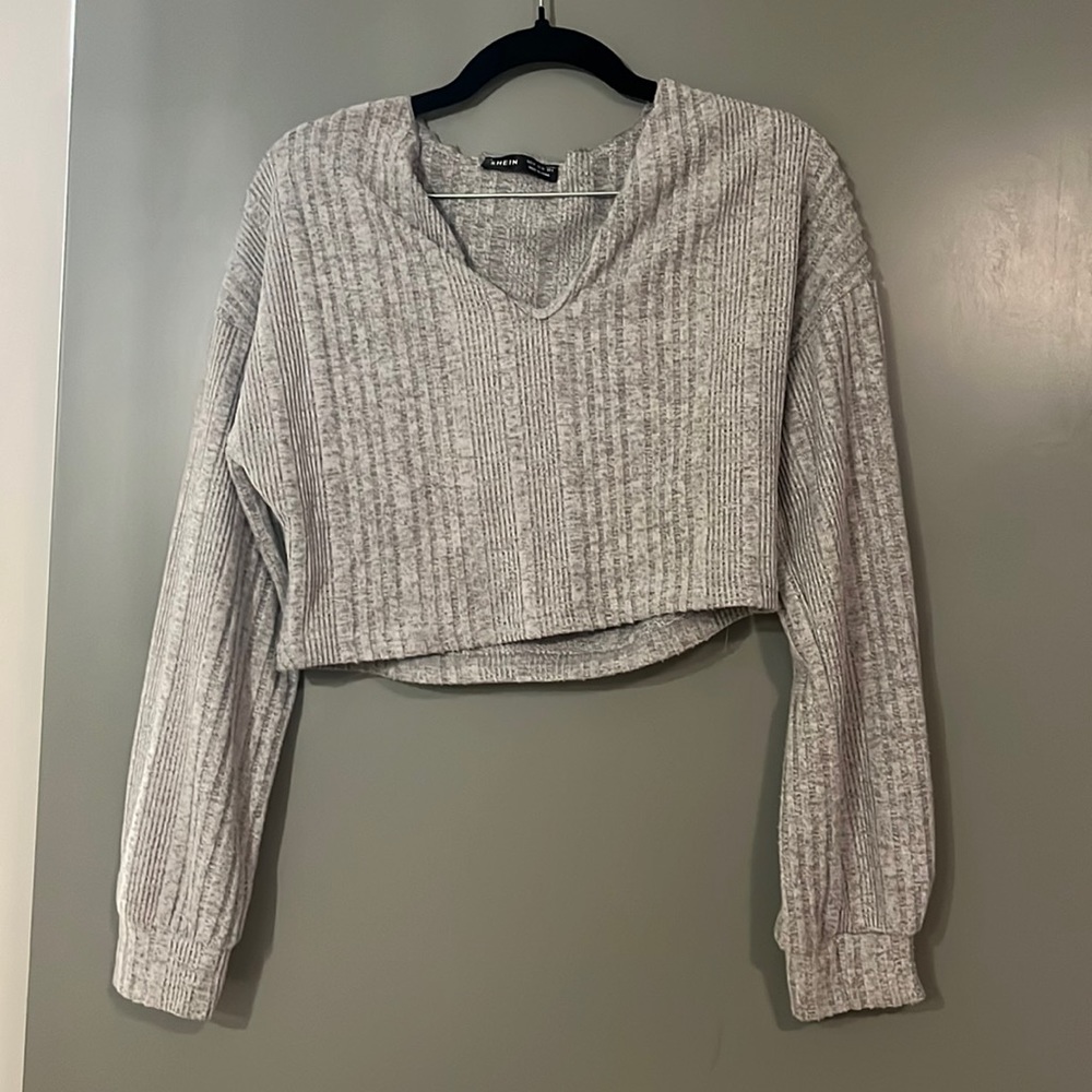 Light grey cropped sweater.
